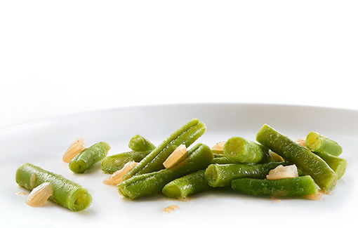 Haricots verts morceaux avec oignons étuvé